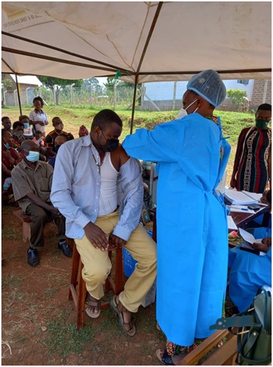 A community member receiving his vaccine.
